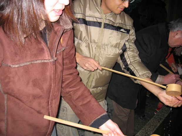 The Penpal showing UPS how to wash his hands at the shrine