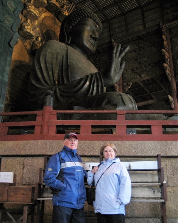 My parents next to the giant bronze Buddha